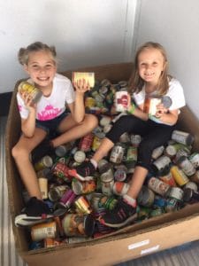 collecting canned goods for food drive